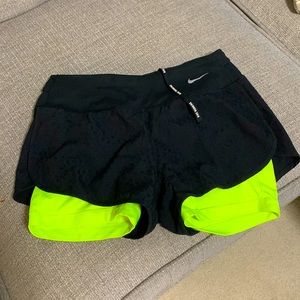 Nike runner shorts with neon lining